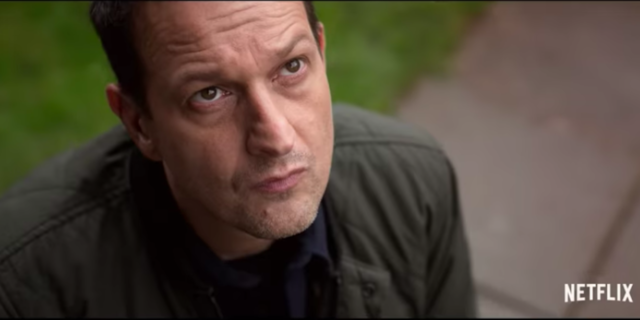 Josh Charles in Netflix's "Away" looking up at the sky