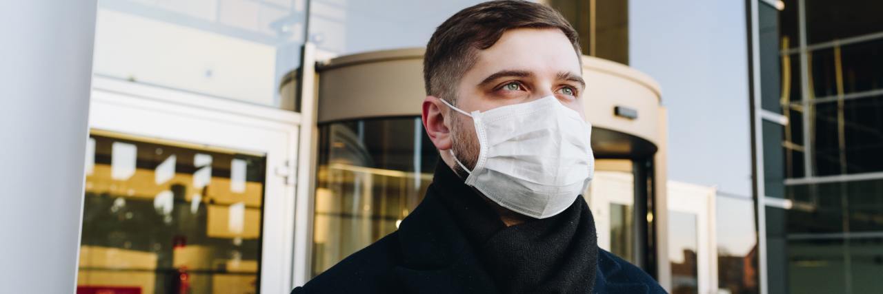 UK Lockdown: The Frustration of People Ignoring COVID-19 man wearing a mask