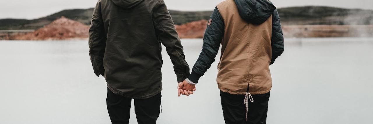 5 Toxic Relationship Habits People Think Are 'Normal' A couple holding hands