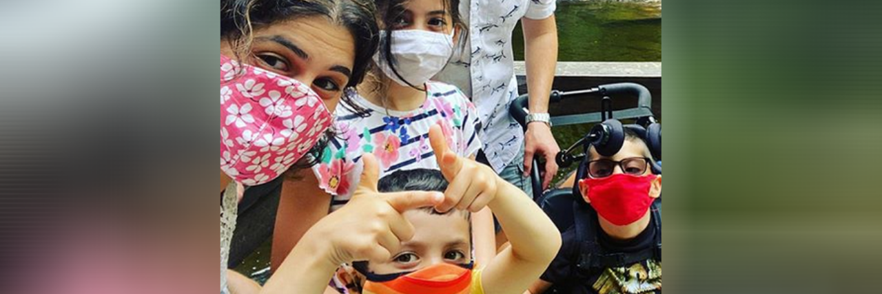 What I Miss and Don't Miss About Parenting Before COVID-19 Jaclyn with her family outdoors.