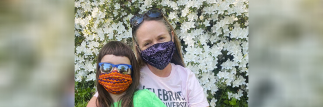 Kate and her daughter wearing face masks.