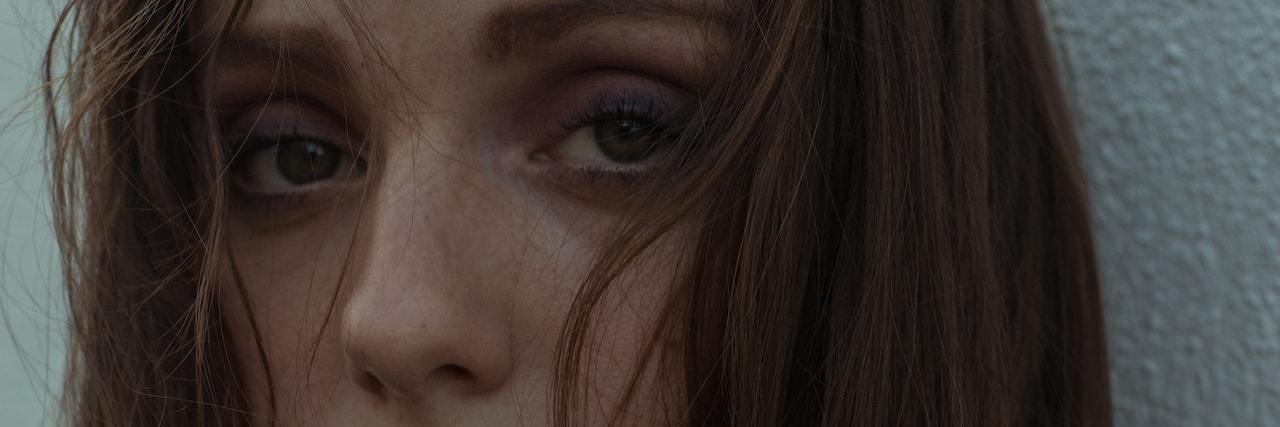 What It's Like to Experience Atypical, Passive Suicidal Thoughts close up of a woman