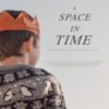 Movie poster for "A Space in Time" featuring a young boy wearing an orange paper crown looking out into the distance