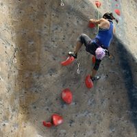 photo of the contributor on a climbing wall