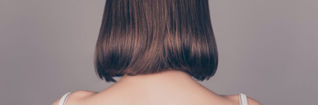 Back view of of woman with medium length hair