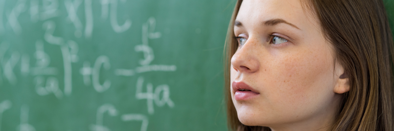 To the Teacher Who Said My Chronic Illnesses Were Psychosomatic Teenager girl sad in class.