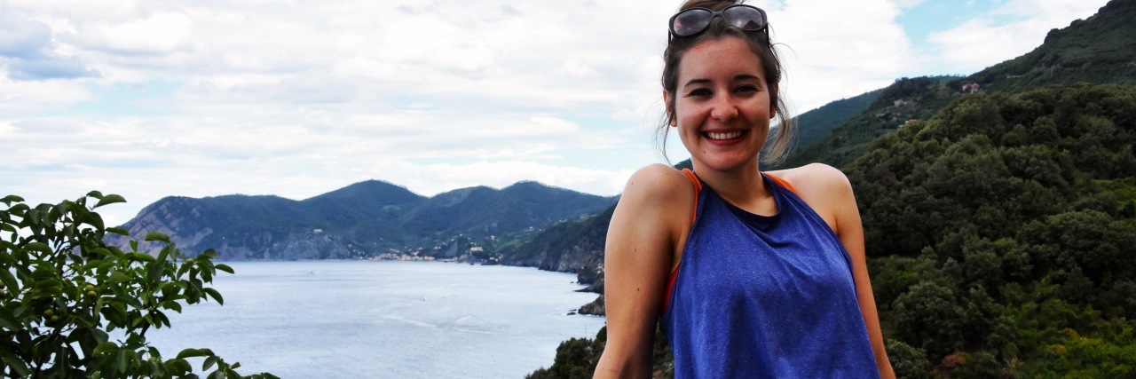 What Living With OCD Feels Like the author sitting outside on the water