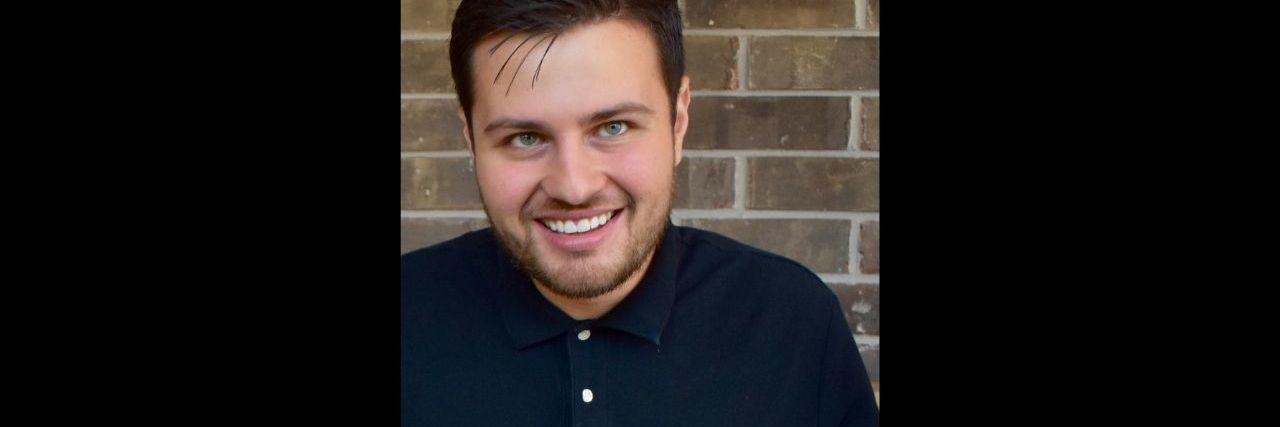 Sharing My Son With Autism With the World Through Social Media a young man smiling at the camera