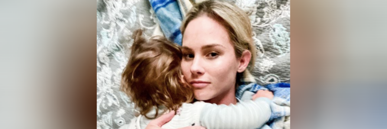 Meghan King Shares Son's Cerebral Palsy Diagnosis in Blog Post Meghan King and her son Hart on the ground