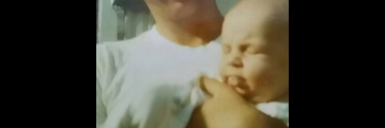 The Impact of Him Saying 'Yes' to Being My Dad A young date holding his baby daughter in the 1970s.