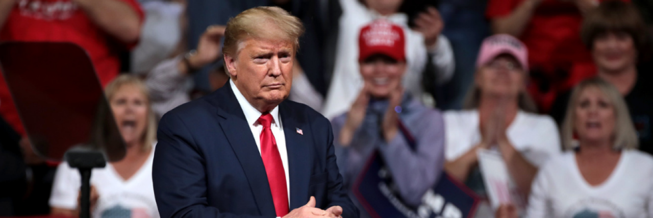 Donald Trump Says 'Don't Be Afraid of COVID' in Tweet Donald Trump at a campaign rally