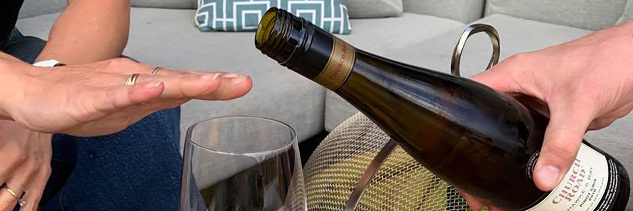 Alcohol Use After a Brain Injury Saying no to alcohol by putting a hand over a glass.