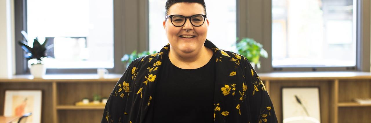 5 Ways Weight Stigma Harms Fat People's Health a fat person smiling