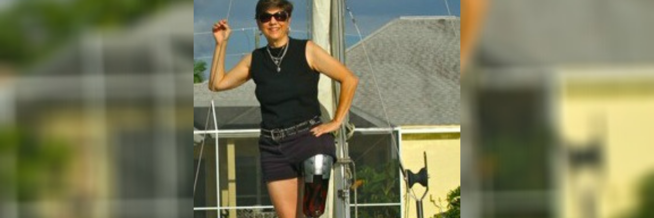 Parents, It's OK to Let Your Kids Ask About My Prosthetic Leg Deb standing on a boat. Her prosthetic leg is visible.