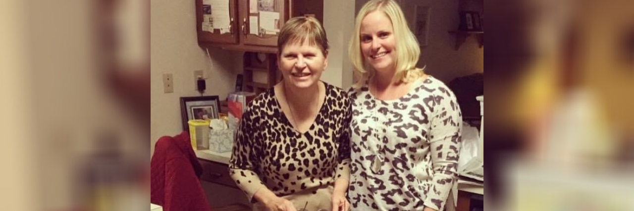 When a Parent With Alzheimer's Doesn't Remember What You Do Together Lauren and her mom standing in the kitchen.