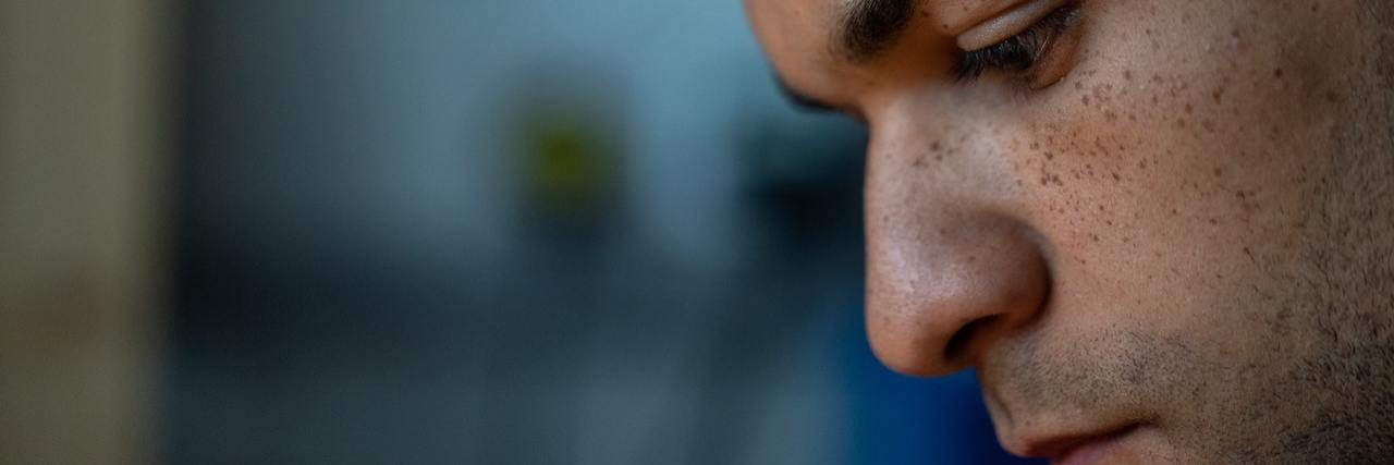 What Is a Bipolar Disorder Mixed Episode? Profile of a man's head as he looks down