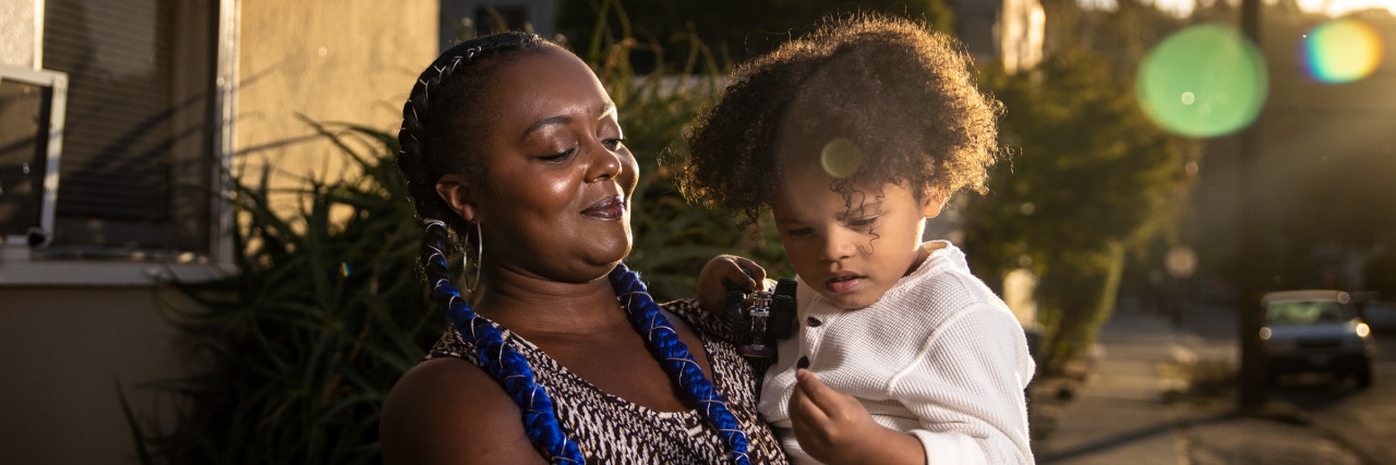 How Families Are Fighting Racism and Disability Discrimination Nakenya Allen and her son Landon outside their home in Martinez, California. Martin do Nascimento / Resolve Magazine