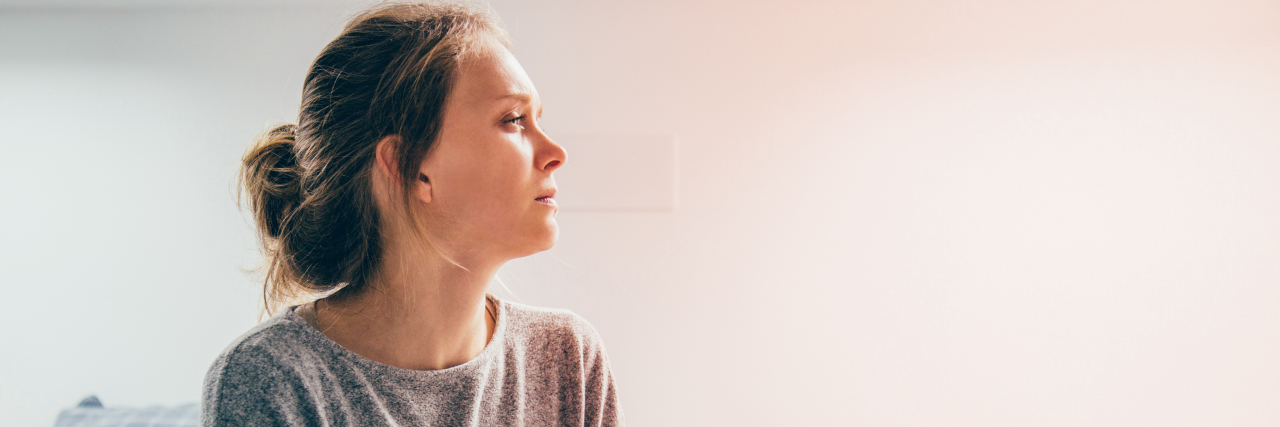 How to Love Your Body After Chronic Illness Changes It woman sick in bed