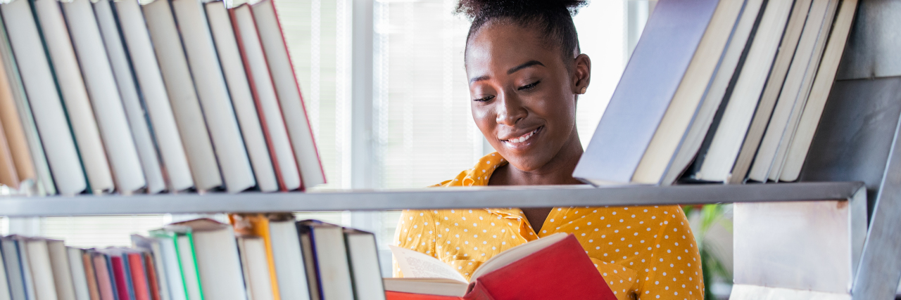 Accepting That I'm Disabled as Someone With Idiopathic Hypersomnia African American college student at library.