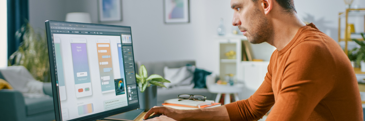 Why Autism Workplace Accommodations Need to Be Fluid Man working from home on computer.