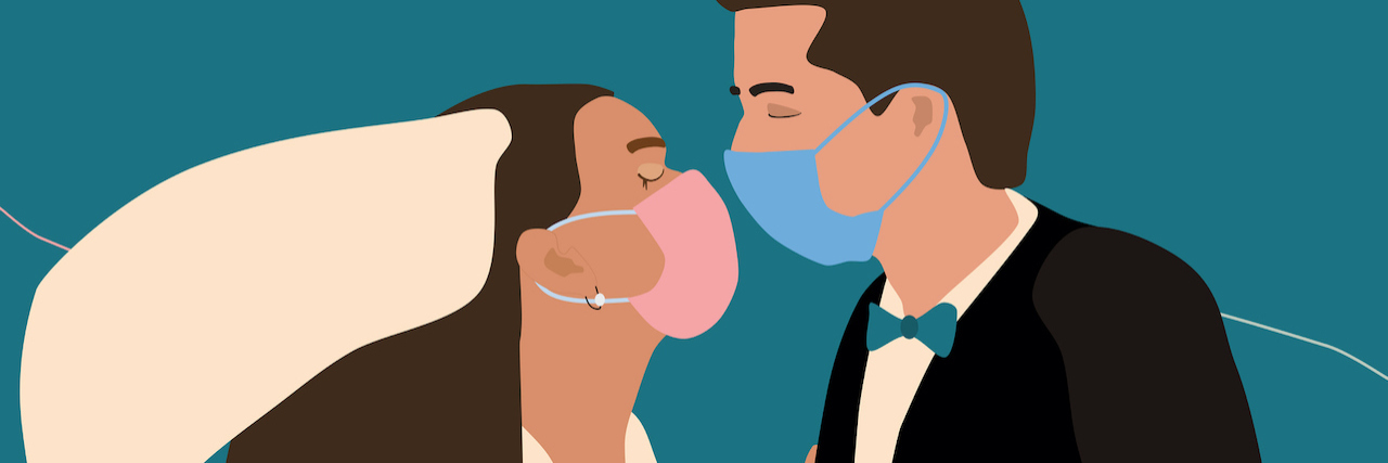 Planning a Wedding During COVID-19 Couple wearing face masks,holding each other.