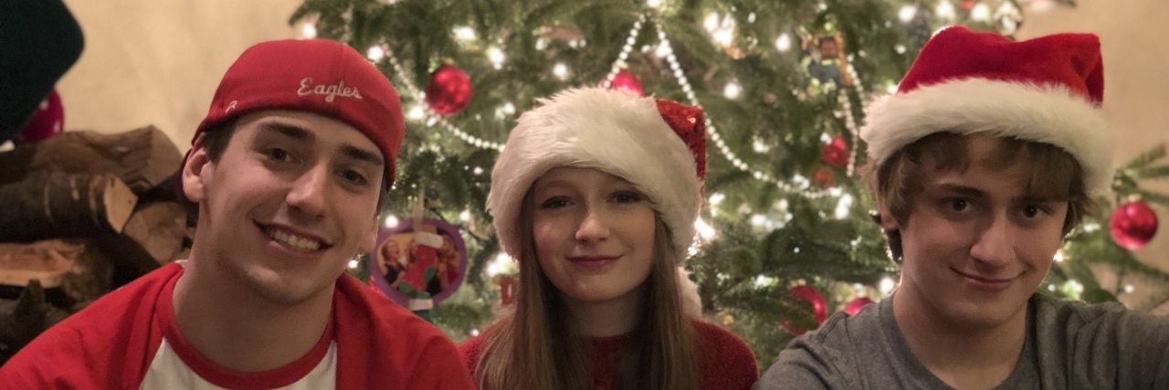 Keeping Your Autistic Loved One Safe and Happy This Holiday Season Kathy's family at Christmas in 2018.