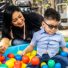 Melissa Alcala and her three-year-old son Gavin play in the ball pit behind their home in Eastern Los Angeles[Martin do Nascimento / Resolve Magazine