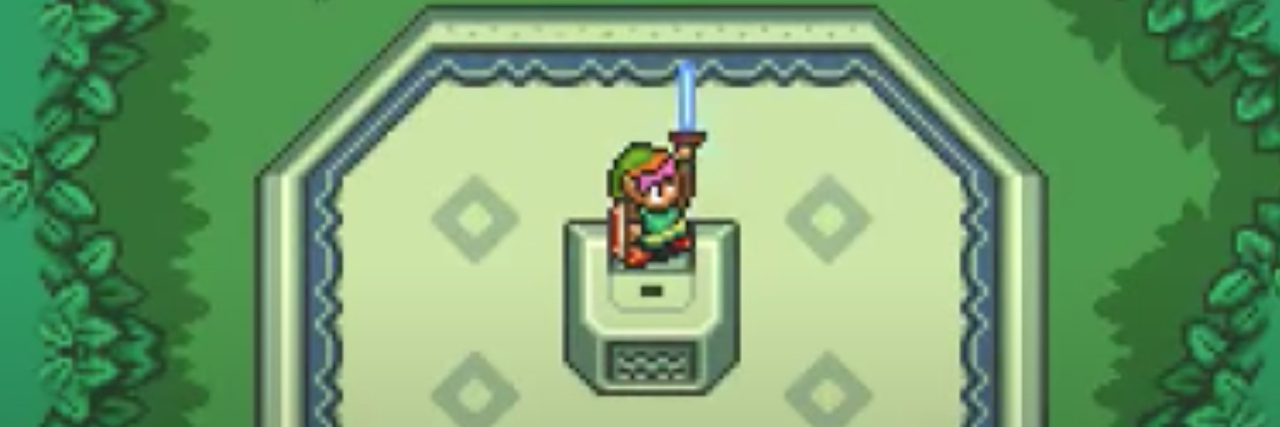 screenshot of The Legend of Zelda: A LInk to the Past, showing hero Link holding a sword aloft