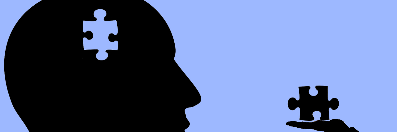 Illustration of man's profile with puzzle piece taken out of his head