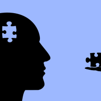 Illustration of man's profile with puzzle piece taken out of his head