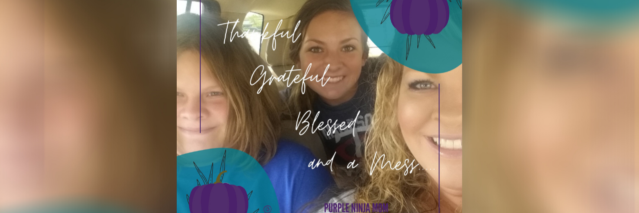 Image of mom with two daughters with the words "thankful, grateful, blessed and a mess"