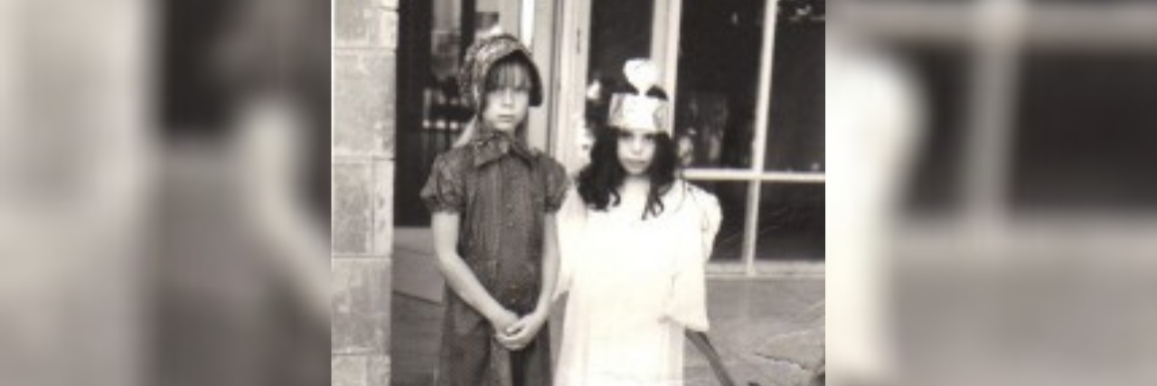 What I Wish 'The Witches' Producers Understood About Ectrodactyly Meg with her friend at Halloween.