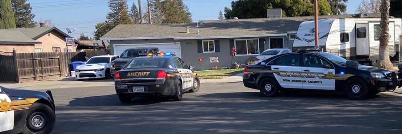 Mental Health Resources After Boy Died from Gunshot During Zoom Class Police cars outside of a house