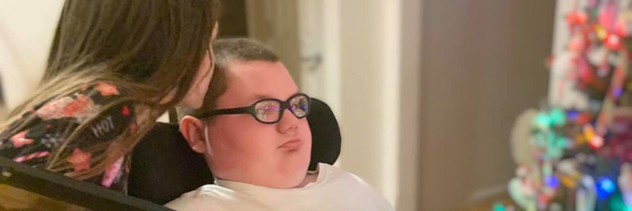 When My Son With Spinal Muscular Atrophy Asks the Hard Questions Decorating the christmas tree.