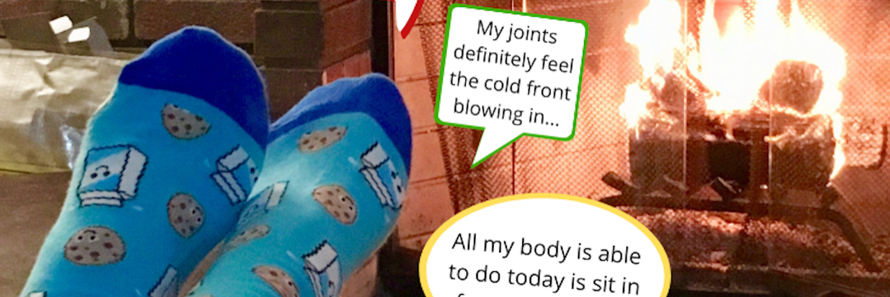 15 Ways Living With Fibromyalgia Changes the Holidays A pair of feel in socks next to a fire place