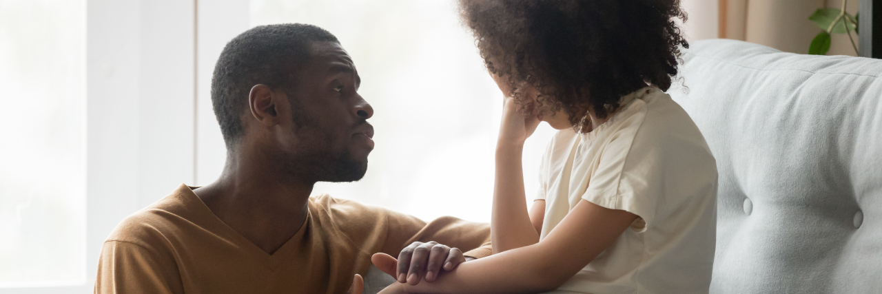 Why Is My Child Having Meltdowns During the Pandemic? Dad comforting daughter.