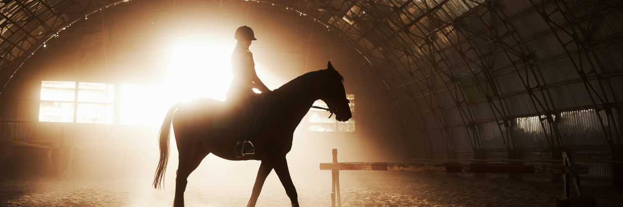 Why Riding Horses Is Therapeutic for My Disability Horse with rider.