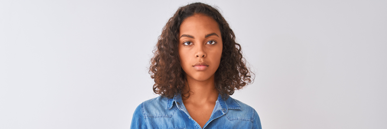 New Report Outlines Health Care Disparities for Autistic People Young brazilian woman wearing denim shirt
