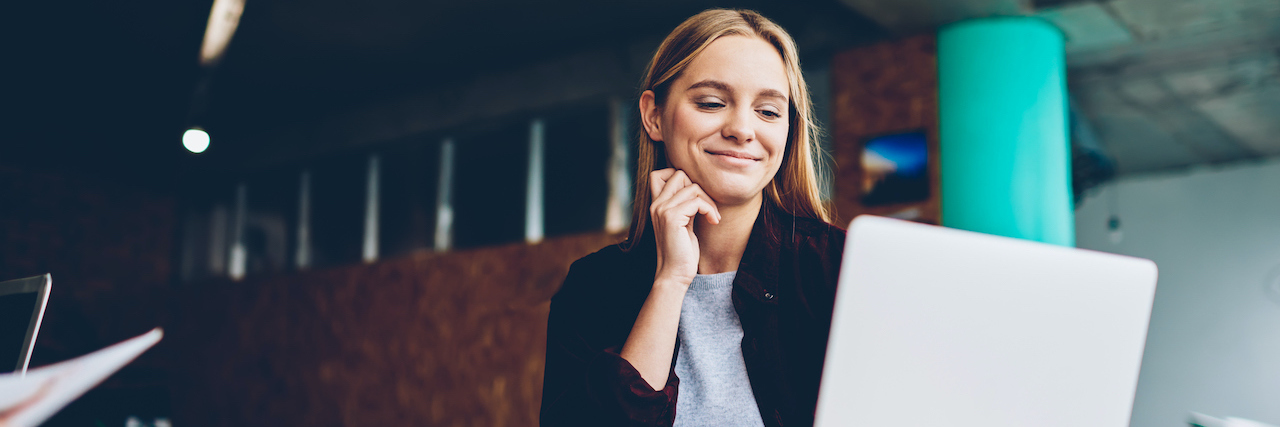 Returning to Work After a Long Mental Health-Related Absence A woman looking at her computer