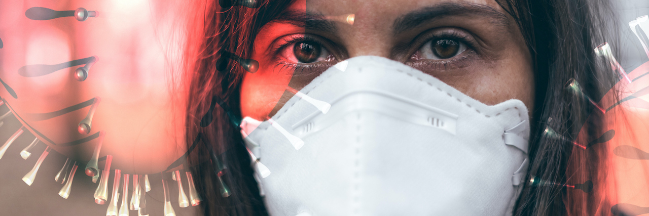 How We're All Being Gaslit About COVID-19 woman wearing mask as a protection from viruses