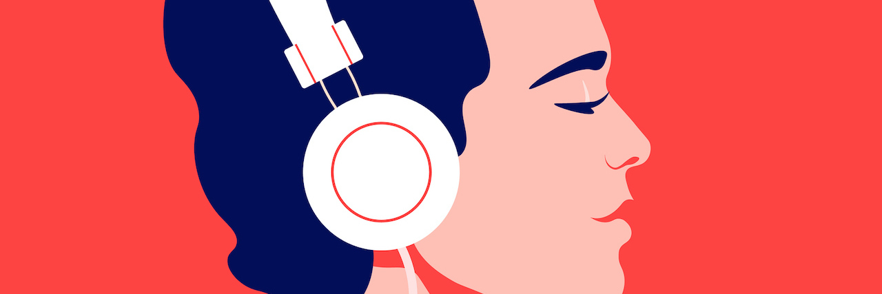 Why 'This Year' by The Mountain Goats Is a 2020 Anthem Young man listen to music on headphones.