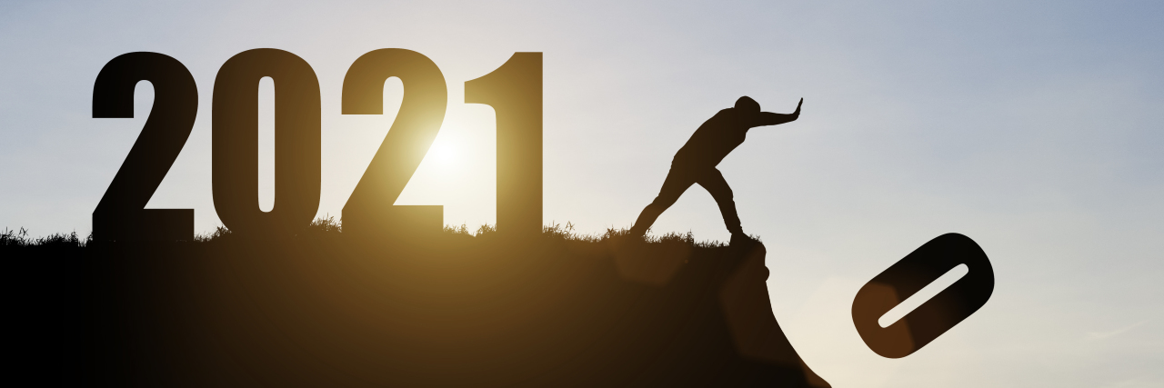 Why I'm Thankful for the Lessons 2020 Taught Me Man pushes number zero off the cliff to 2021.