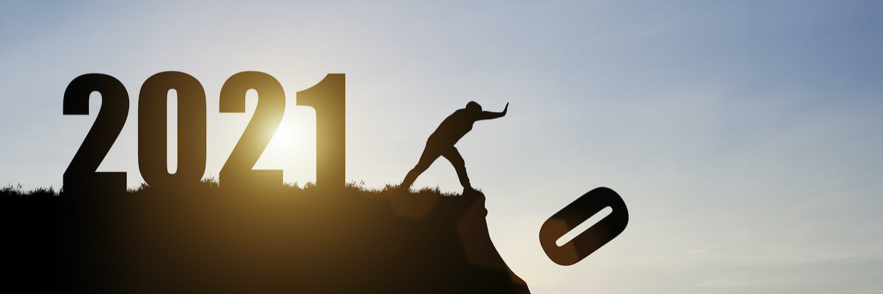 My Breakup Letter With 2020 Man push number zero down the cliff where has the number 2021 with blue sky and sunrise. It is symbol of starting and welcome happy new year 2021.