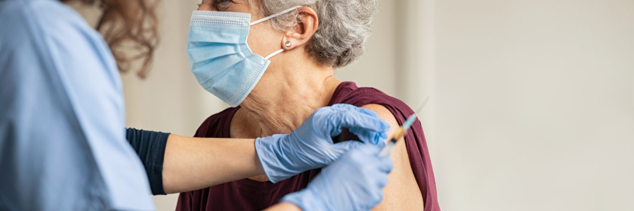What Seniors Can Expect When COVID Vaccines Begin to Roll Out General practitioner vaccinating older patient in private clinic