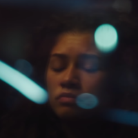 Zendaya's character Rue from 'Euphoria' staring out a window