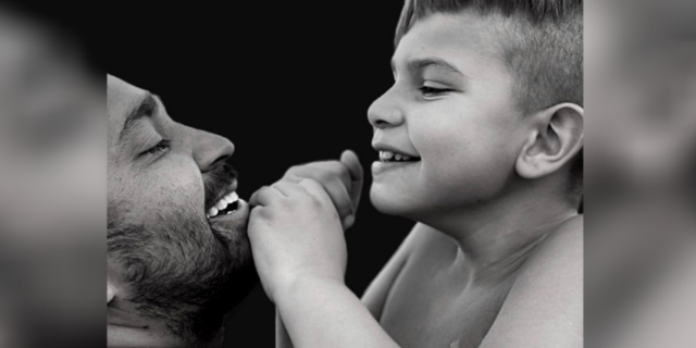 3 Things Not to Say to the Parent of a Child With a Disability Black and white photo of happy father and son.