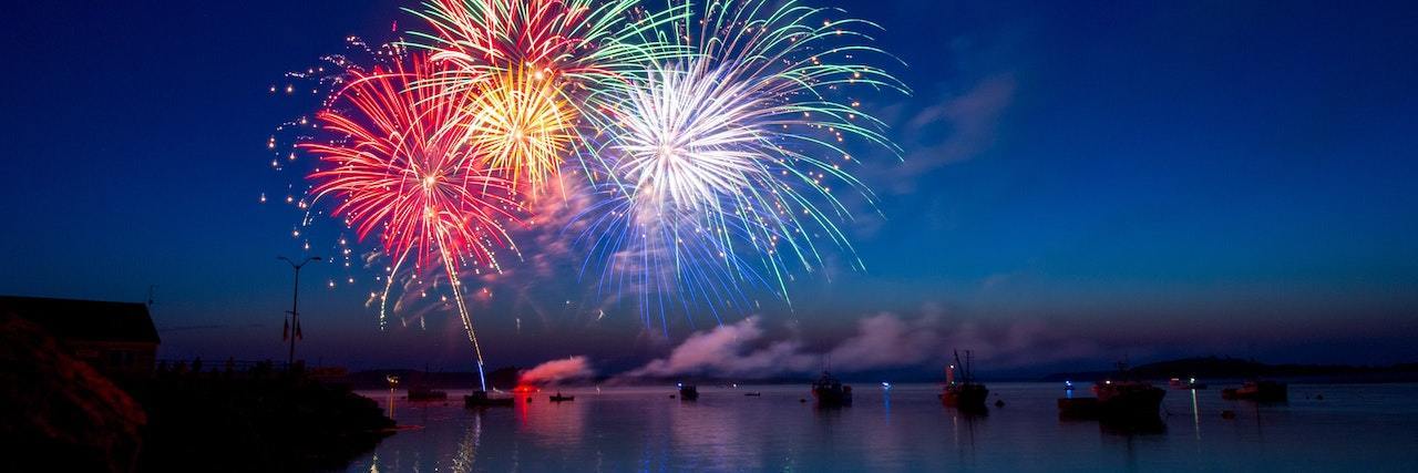 New Year's Eve Tips for Anyone Struggling Mentally fireworks over the water