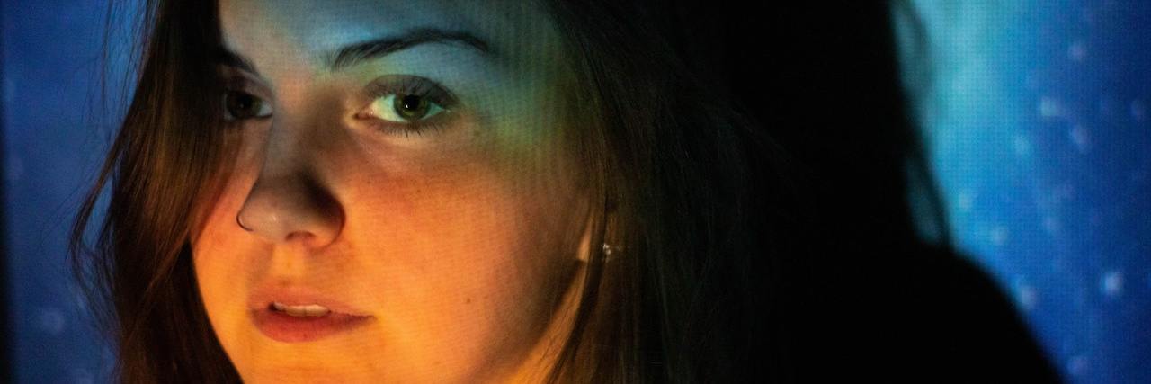 Mental Illness: Feeling Like You're 'Too Much' for Friends A woman looking serious