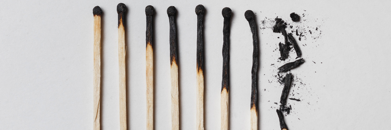 Recovering From Mental Health Burnout a row of burnt matches