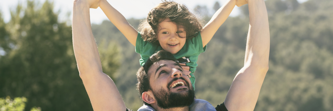 The Only Reason I Feel Grief for My Child on the Autism Spectrum Father and daughter playing outdoors